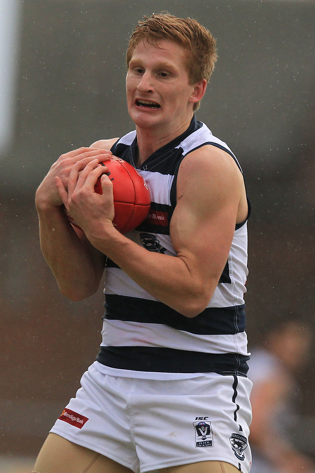 VFL 2015 Rd 16 - Frankston v Geelong MELBOURNE, AUSTRALIA - AUGUST 02: Dean Gore of Geelong takes a mark during the round 16 VFL match between Frankston and Geelong at Frankston Oval on August 2, 2015 in Melbourne, Australia. (Photo by Graham Denholm/AFL Media/Getty Images)